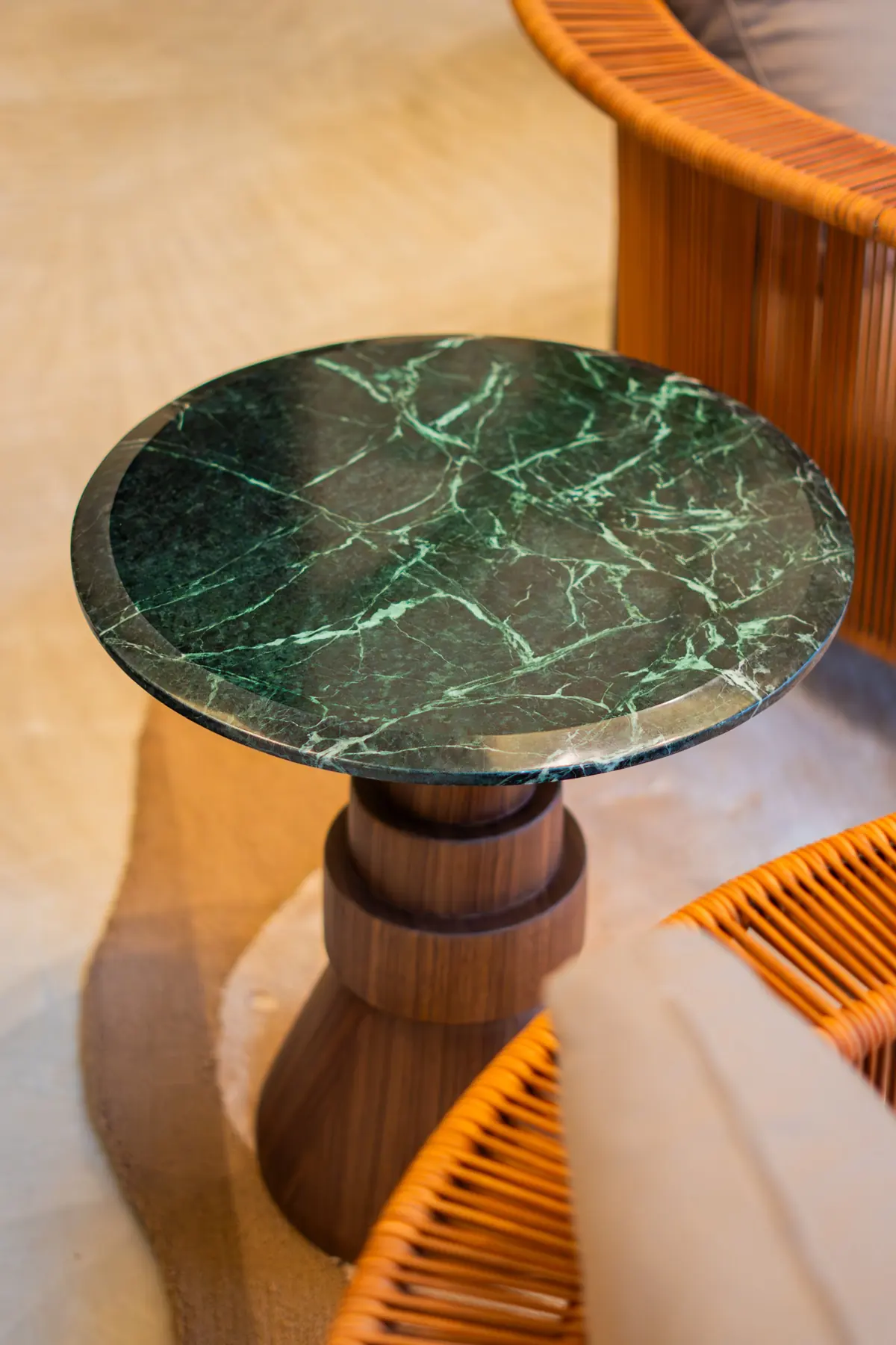 Green marble side table on a turned walnut base